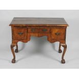 A 19th century walnut veneered and crossbanded Queen Anne style lowboy,