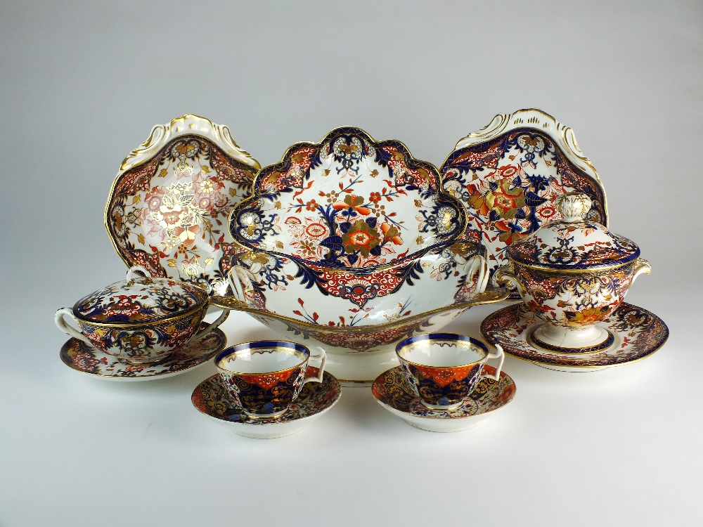 An assembled and matched part tea/dessert service of Derby porcelain in the Imari palette,