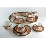 A Royal Crown Derby tea service, pattern 2649, early 20th century, comprising six cups,