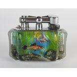 A Dunhill & 'Aquarium' table lighter, circa 1955 designed with fish plants and rocks,