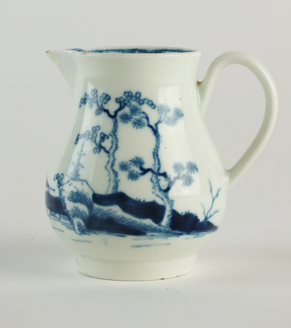 A Worcester blue and white jug painted in the 'Cannonball' pattern, circa 1775-80,
