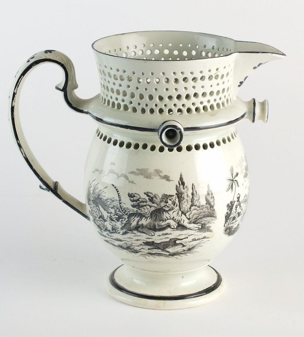 A creamware puzzle jug, early 19th century,