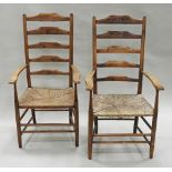 A set of six ash and oak high-ladder back elbow chairs, after the design by Ernest Gimson,