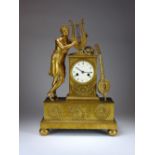 An early 19th century Empire ormolu mantel clock, the 4 inch convex enamel dial signed 'L S Mallet,