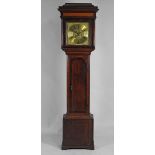 A George III oak crossbande eight day longcase clock the12 inch square brass dial signed Samuel
