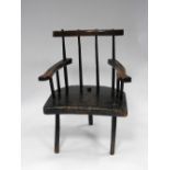 A 19th century Welsh stick back primitive armchair,