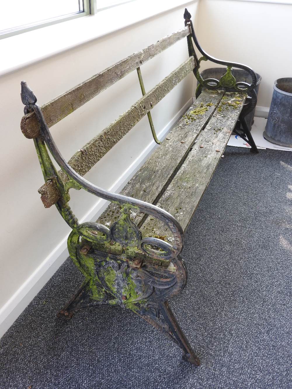 A Victorian garden bench by Coalbrookdale designed by Christopher Dresser bears ' C B Dale Co' mark