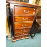 A reproduction mahogany tall boy chest of drawers,