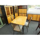 A Musterring German designed mid 20th century dining suite including a draw-leaf table,