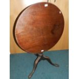 A 19th century mahogany tripod tilt top occasional table.