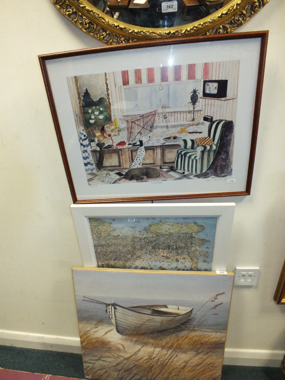 A.R. Fisk, Rowing Boat on a Beach, oil on canvas, together with a circular mirror and two prints.