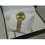 A 9ct gold Strand quartz wristwatch within box.