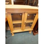 A reproduction pine glazed sideboard or dresser top section.