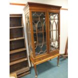 An 18th century style mahogany china display cabinet on a single drawer stand with cabriole legs