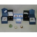 Two 9ct gold pendants together with two pairs of 9ct gold earrings and six 9ct gold stone set rings,