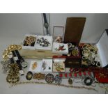 A large collection of various pieces of costume jewellery to include bead necklaces, metal chains,