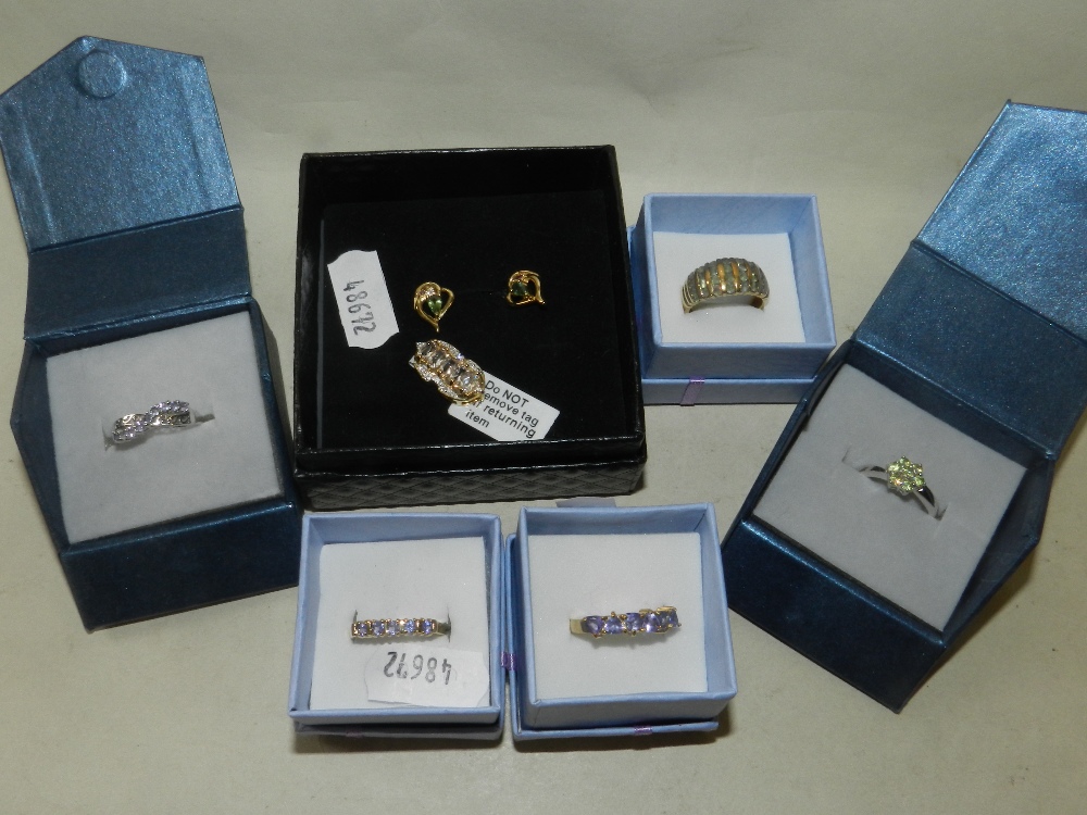 A 9ct gold pendant, a pair of 9ct gold earrings and five 9ct gold earrings,