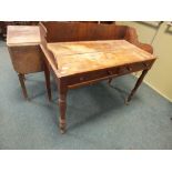 An Edwardian mahogany pedestal desk together with a 19th/20th century mahogany washstand and a