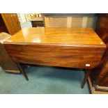 A 19th century mahogany drop-leaf occasional table with a single cock beaded drawer and raised on