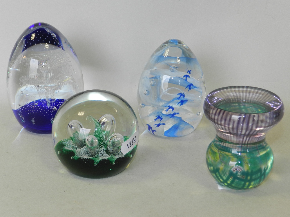 Four Caithness glass paperweights including 'Moonflower',