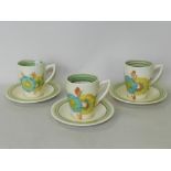 A group of three Wilkinson's Ltd cups and saucers, attributed to Clarice Cliff,