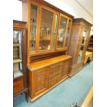 An early 20th century oak dresser with Art Nouveau detail,