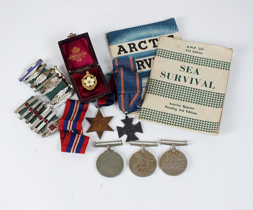 A pair of World War II medals, Defence and War medal, in air ministry cardboard box addressed to 'J.