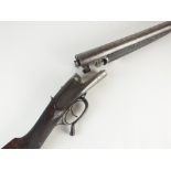 A 12 bore non ejector double barrelled side by side shotgun marked H Robinson, Damascus barrels,