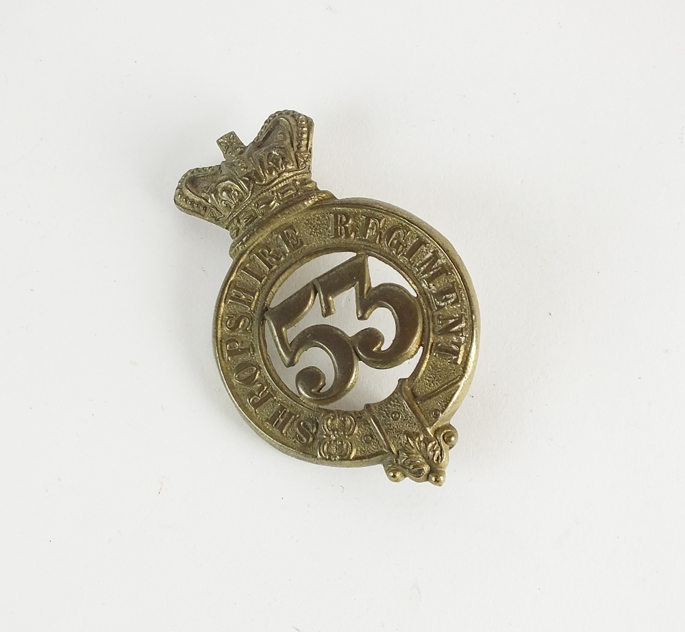 A 53rd regiment of foot (Shropshire regiment) side cap badge