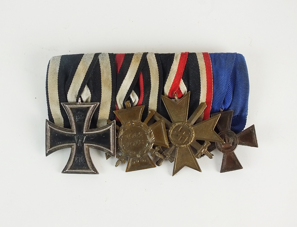 A German group of four World War I and World War II medals, comprising; 1914 Iron cross,