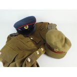 A selection of military hats and jackets to include: 1965 British beret by Basque Ltd,