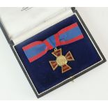 An Elizabeth II silver gilt and red enamel 'Royal Red Cross', 1st class,
