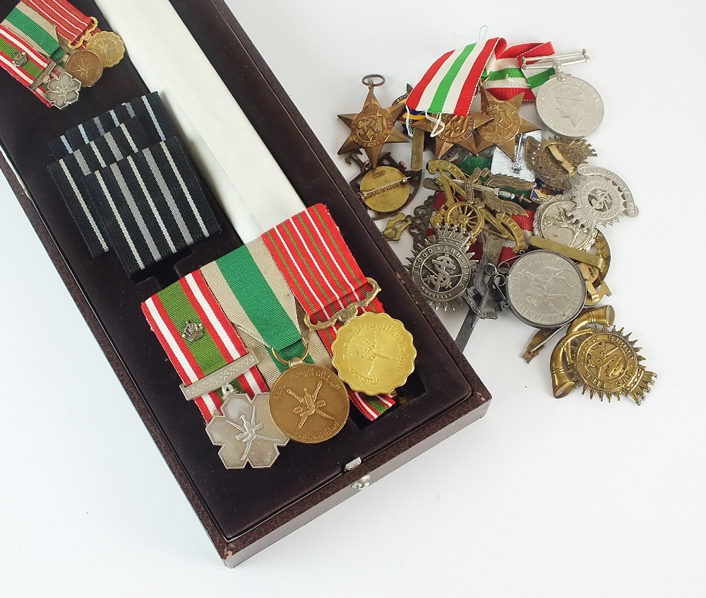 A cased set of three medals, awarded to squadron leader Gerard Woods by the Sultan of Oman,