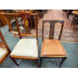A set of four Edwardian style mahogany dining chairs with patera decorated backs,