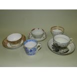 A collection of 18th Century English porcelain tea bowls and associated saucers including examples