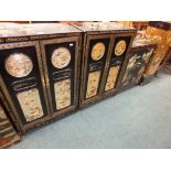 A pair of Oriental lacquer two door cabinets with Greek key borders,