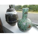 A Chinese celadon ground famille rose vase, Yongzheng six-character mark but later,