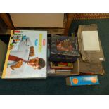 A collection of vintage jigsaw puzzles, board games and play sets,