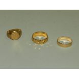 A 22ct gold plain polished wedding band together with an 18ct gold faceted wedding band and an 18ct