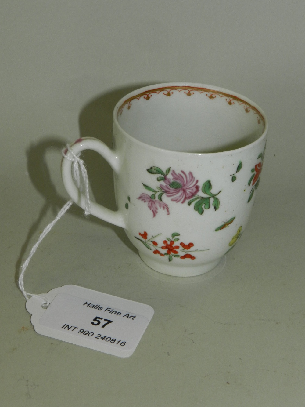 An 18th century English porcelain coffee cup, possibly Lowestoft,