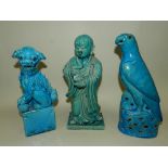 A pair of Chinese turquoise glazed Foo dogs,