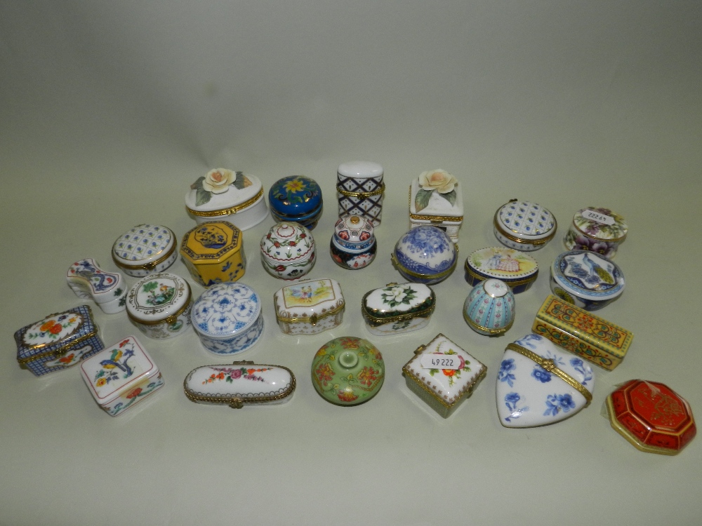 A collection of porcelain and other materials, trinket boxes,