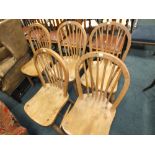 A set of five elm and beech hoop and stick back kitchen chairs