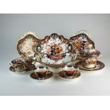 An assembled and matched part tea/dessert service of Derby porcelain in the Imari palette,