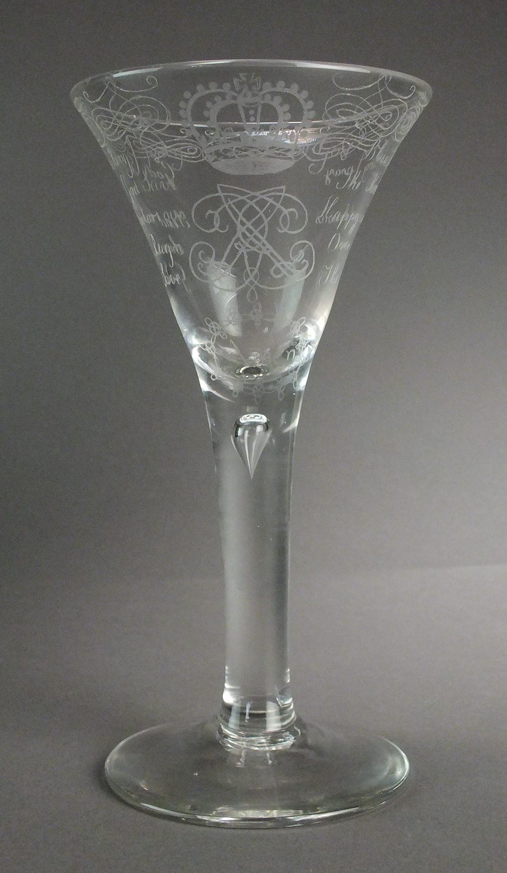 A reproduction 'Amen' style glass, inscribed with the verse 'God Save the King, God Bless the King,