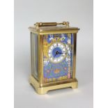 A Halcyon Days enamels carriage time piece,