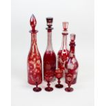 Four Bohemian ruby flashed decanters and stoppers, late 19th century,