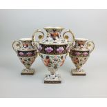 A garniture of three Derby porcelain vases, early 19th century, each of two handled urn form,