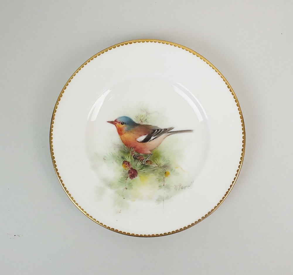 A Royal Worcester plate, date code for 1922, finely painted with a Chaffinch and signed W.