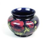 A Moorcroft Anenome pattern jardiniere, of ovoid form with everted rim,